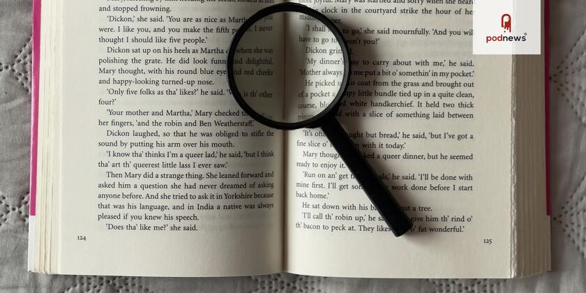 A book and a magnifying glass