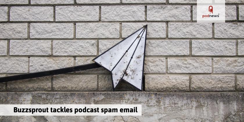 An email symbol on a brick wall for some reason