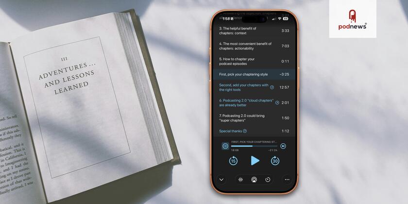 A book open at a chapter, with an iPhone showing podcast chapters