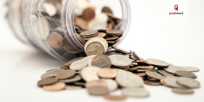 Coins spilling from a jar