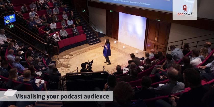 Valerie Geller speaks in front of an audience