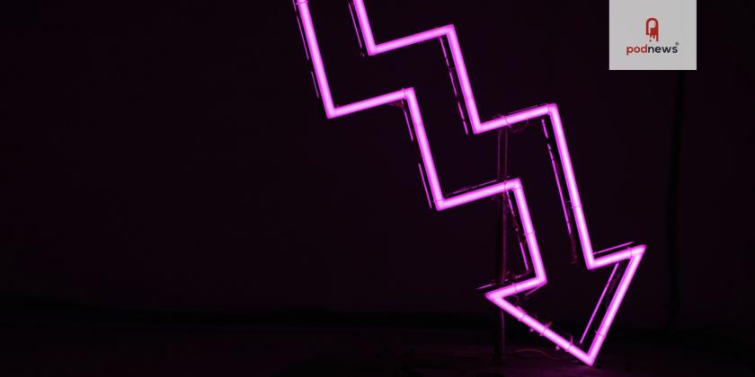 A down arrow in neon, photographed in Miami FL, USA