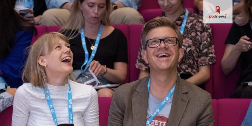 Two conference goers having a laugh; from Next Radio 2018.