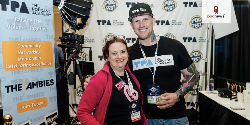 Ti King on TPA's stand at Podfest in early 2026, chatting with Jennifer Longworth