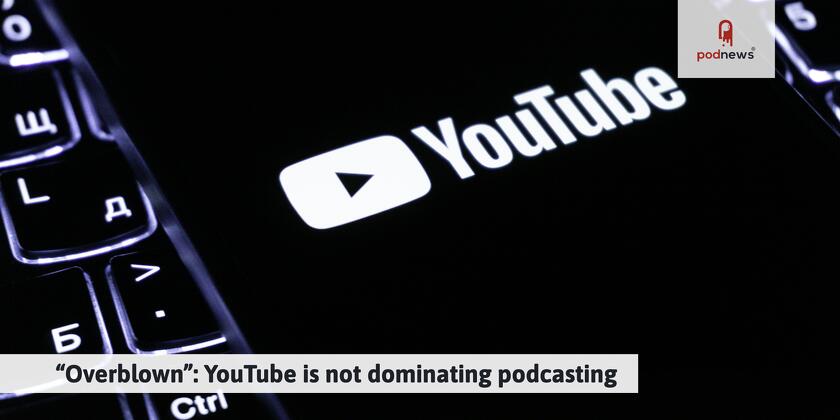 A YouTube logo, over a keyboard