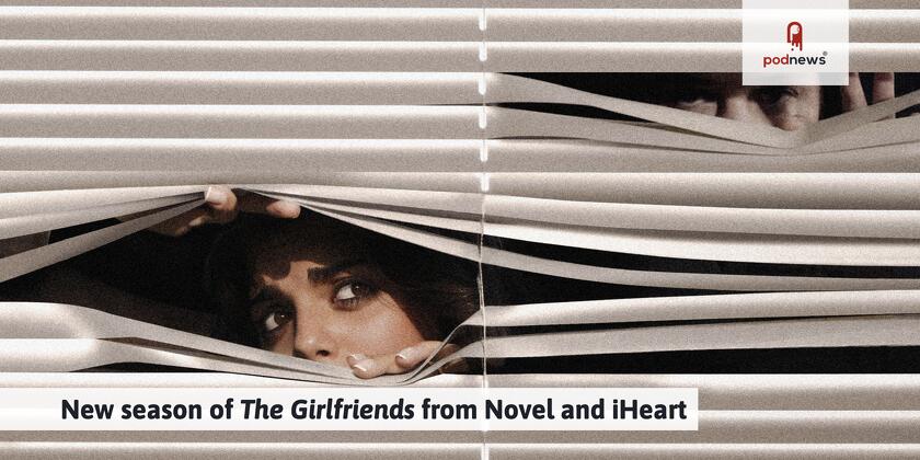 A man looking through some blinds