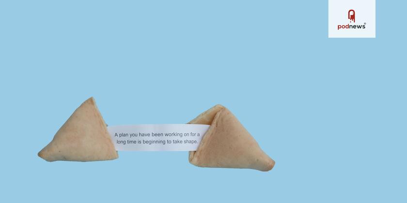 A fortune cookie with a prediction inside it