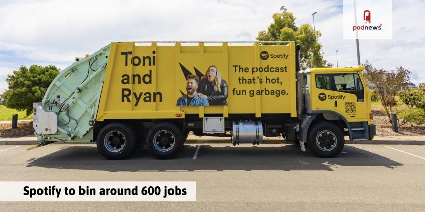 A garbage truck with a Spotify advert on it.