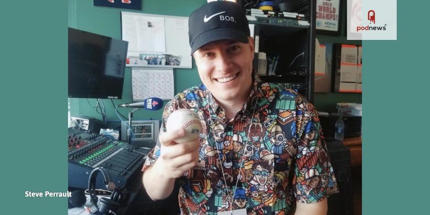 Steve Perrault, holding a baseball