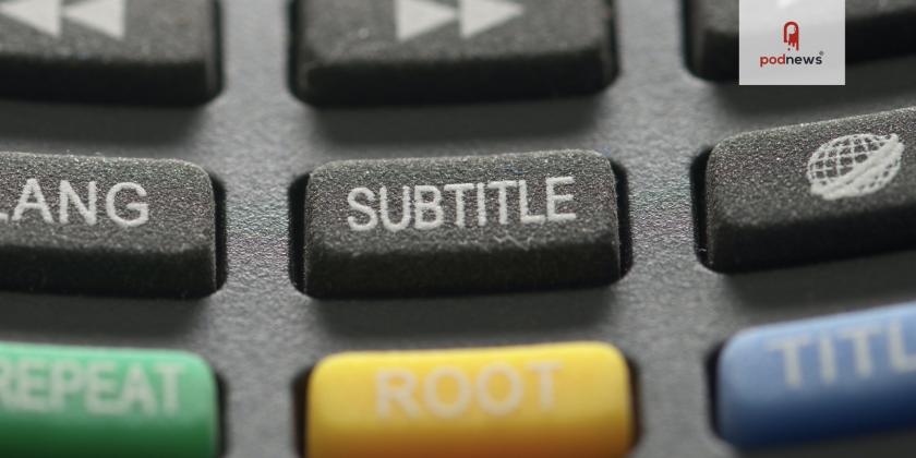 A close-up of a television remote, with the SUBTITLE button highlighted