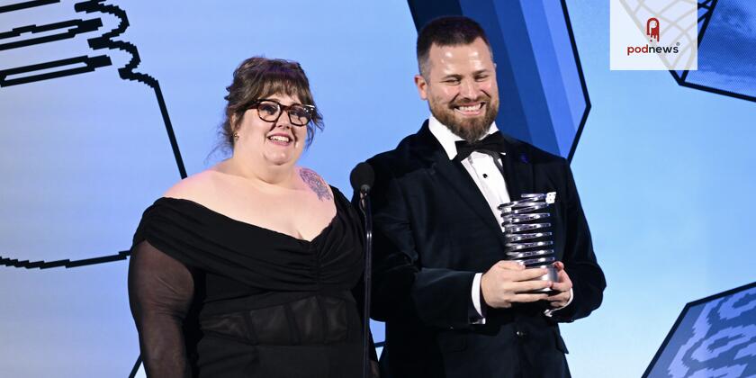 Toni and Ryan accept their award