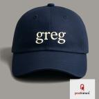 A cap with the word 'greg' embroidered in it