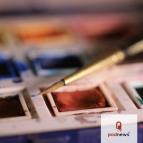 Paints and a paintbrush